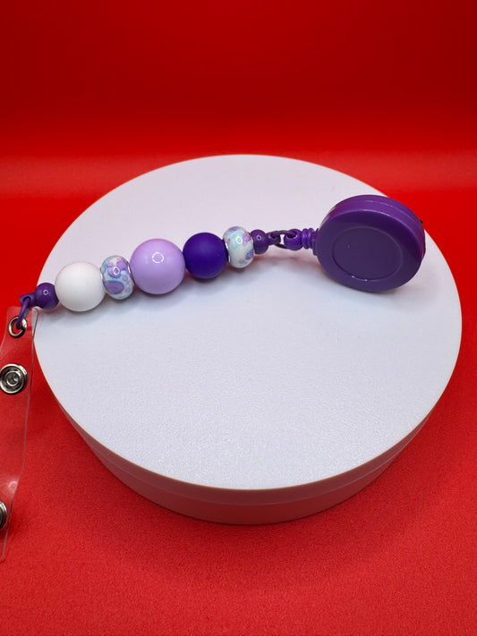 6 Piece Set (Kindness Keychain, Badge Holder, 2 Pullies & 2 Pens) (1) Purple